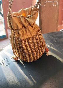 golden potli bag for function