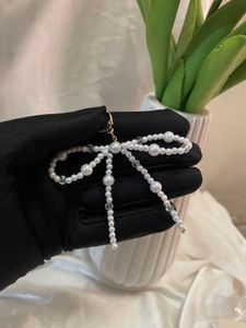 Bow Key Chain With Pearl