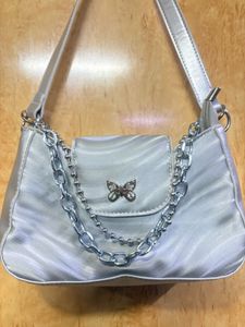 silver shoulder bag