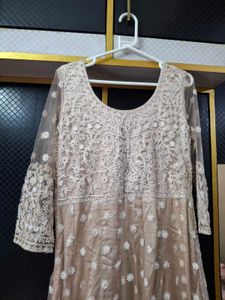 Elegant Beige Embroidered Anarkali gown