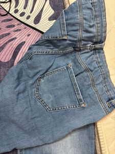 Distressed Blue Denim Jeans