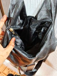 Chic Black Leather studded Hobo Bag