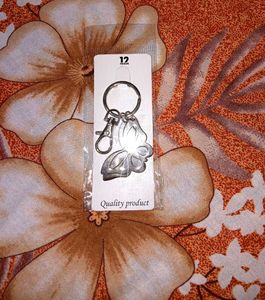 a beautiful butterfly keychain in metal