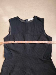 Sheer Black Peplum Top from paris