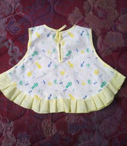 Cute Baby Girl's White Bib with Yellow Trim