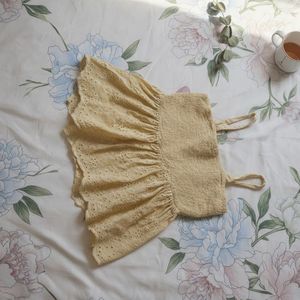 Smocked Eyelet Peplum Top