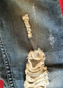 Distressed Blue Denim Jeans