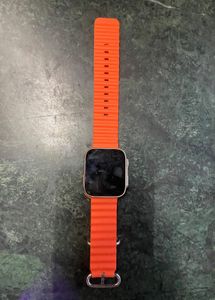 Smartwatch with Vibrant Orange Band