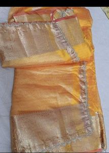 Elegant Yellow &amp; Gold Saree With Red Tint