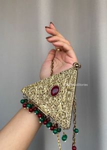 Exquisite Geometric Clutch with Gemstone