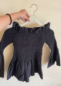 Black Off-Shoulder Smocked Peplum Top