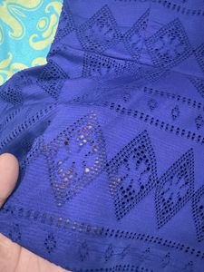 Blue Peplum Top with Cutout Detail