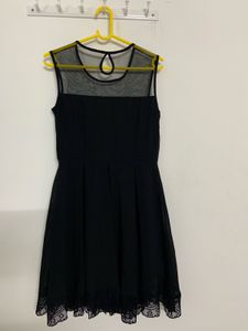 Chic Black Lace Trimmed Sheer Neck Dress