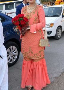 Exquisite Peach Embellished Sharara Set