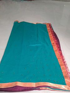 Elegant Teal Saree with Golden Border