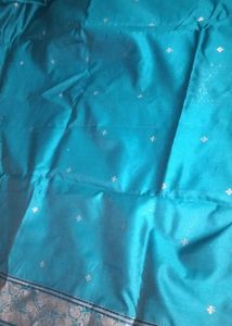 Elegant Teal Saree with Intricate Border