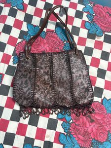 Elegant Embossed Floral Handbag