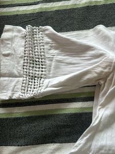 Elegant White Kurta Set with Intricate Detailing