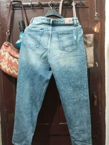Distressed Blue Denim Jeans