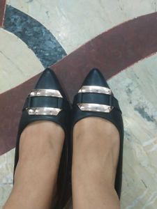 Chic Black Pointed Toe Flats with Buckle Accent