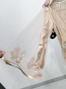 Elegant Gold Embroidered Maxi Dress