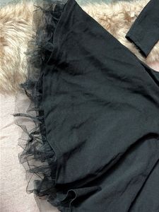 Chic Black Off-Shoulder Dress with Tulle Hem