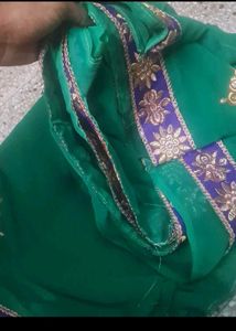 Elegant Green Saree with Embellished Border