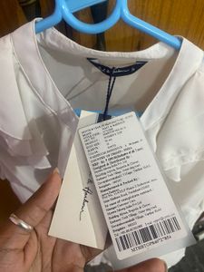 Elegant White Ruffled Blouse