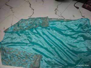 Beautiful Teal Embroidered Kurta Set