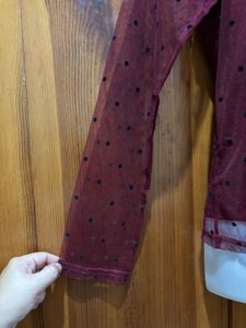 Polka dotted sheer top