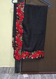 Elegant Black Saree with Red Floral Embroidery