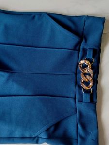Stylish Teal Flared Pants with Chain Detail