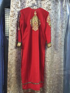 Festive wear red Pakistani suit with chudidar pant