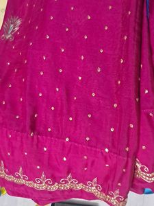 Beautiful Pink Saree with Golden Embellishments