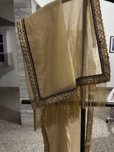Elegant Golden saree with Embellished Border