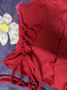 Red Sleeveless Top with Tie Details