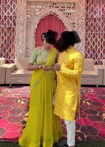Vibrant Yellow Sequined prestitched Lehenga Choli