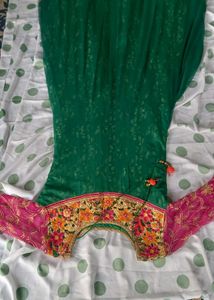 Elegant Emerald Green Saree with Floral Blouse