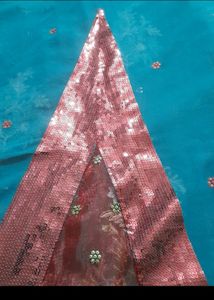 Party Wear Saree.Belive Me Its Too Preety, I Dont Wear Sarees So M Selling.Beautiful Sequence Pattern.colour Is Dark Green ,not Blue