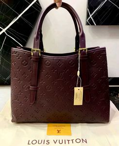LOUIS VUITTON BABYLONE TOTE* WITH DUSTCOVER