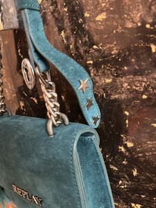 relay studded shoulder bag