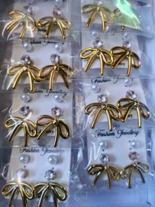 Set of Bow &amp; Pearl Earrings