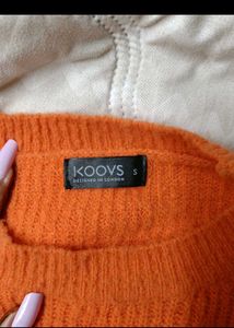 Orange Ribbed Knit Sweater with Black Stripes
