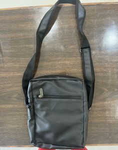 Victoria cross leather bag