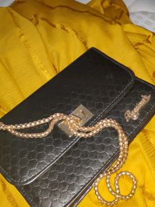 Chic Black Clutch with Gold Hardware