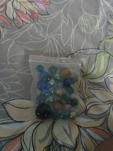 Bag of colorful glass marbles