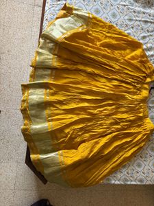 Vibrant Yellow Ethnic Skirt with Golden Border