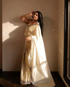 Elegant Cream Saree with Embellished Blouse