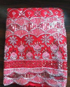 Red dress material with embroidery work