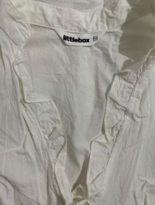 White Ruffled Button-Up Blouse